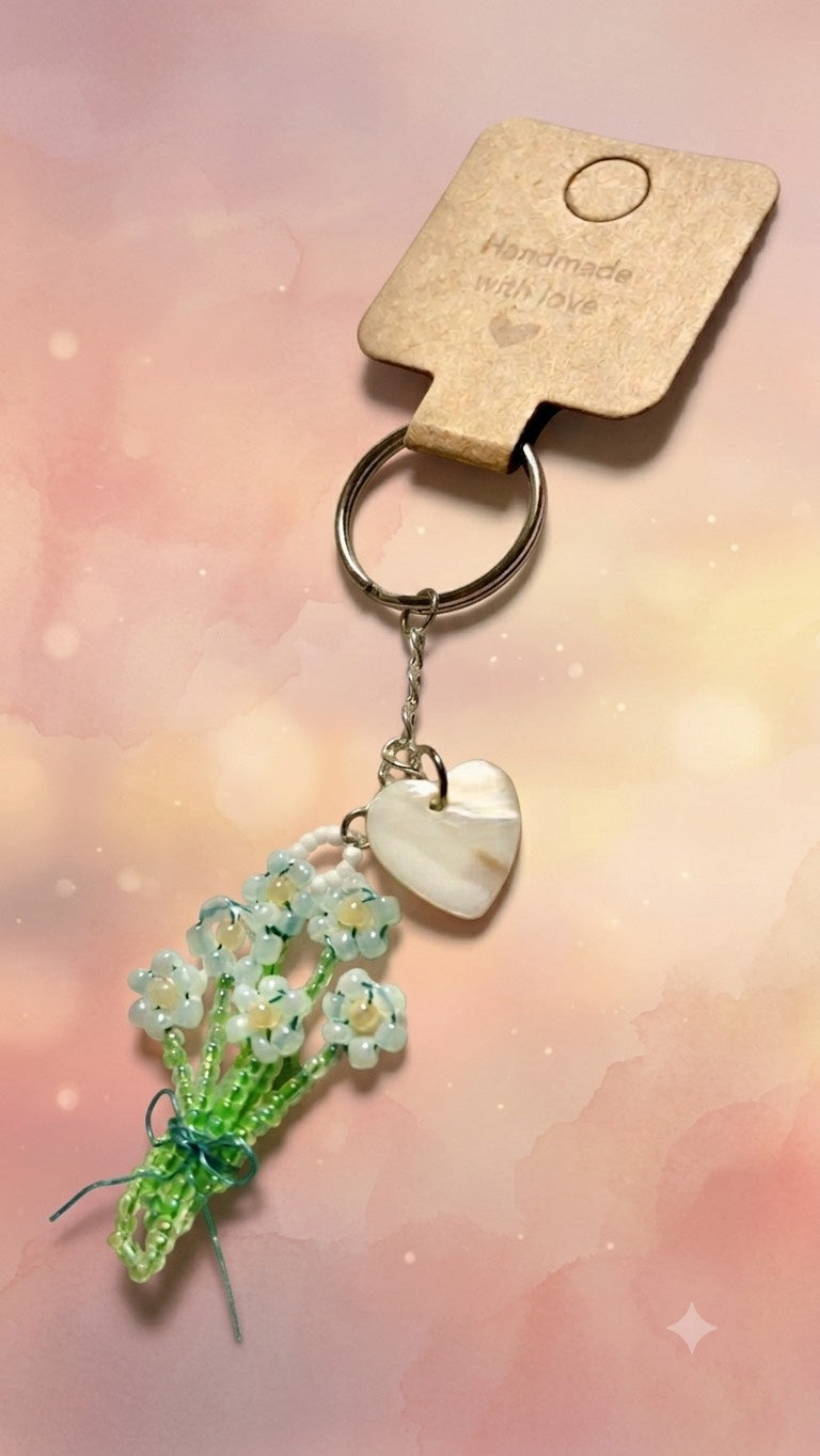 Six Blue Blossoms Bouquet Key Charm